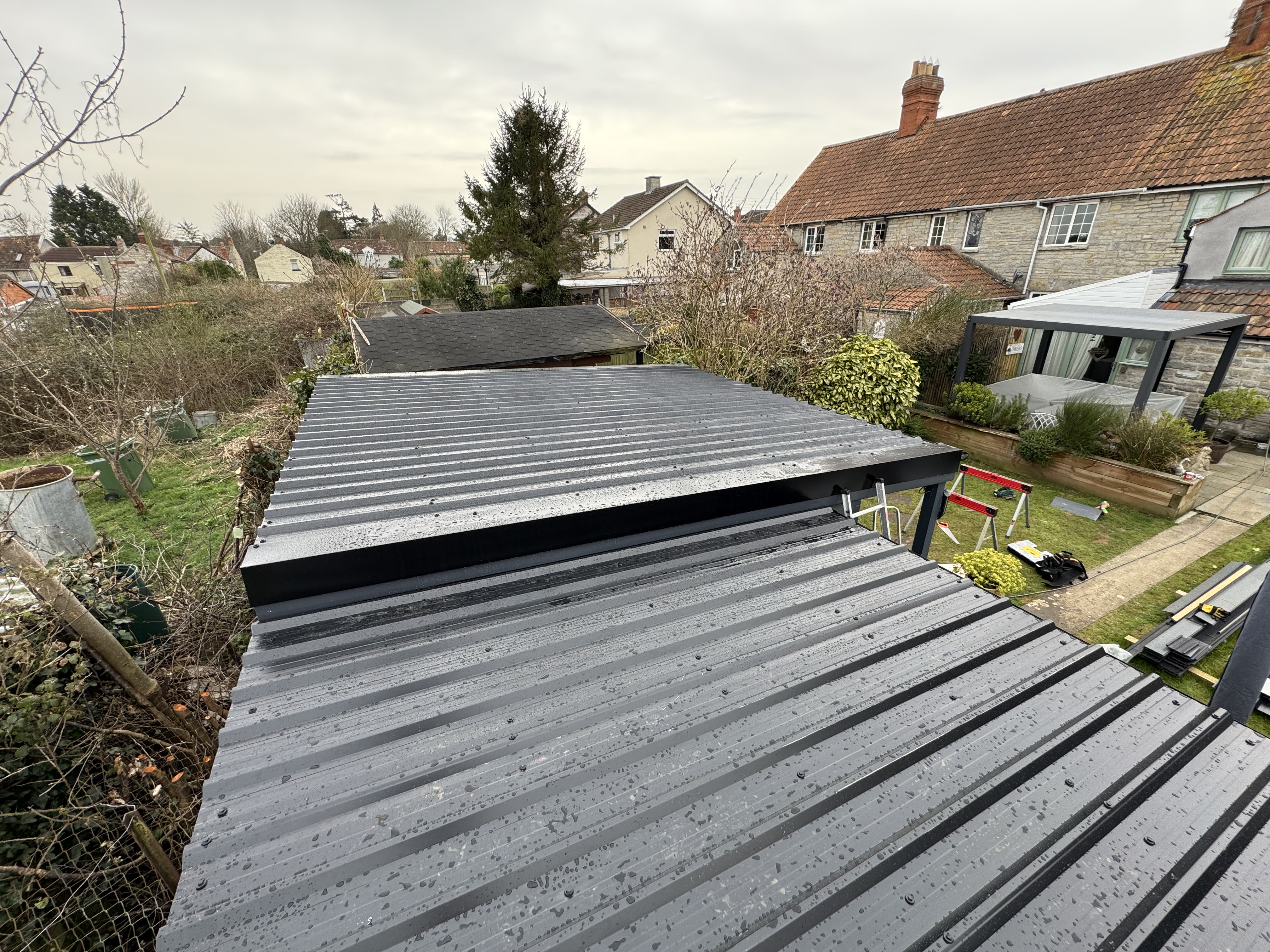 Metal roof on outbuilding Street